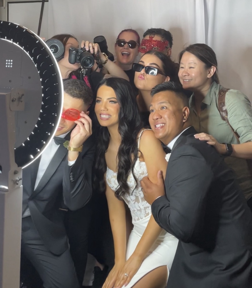 Wedding party enjoying a Smile Photo Booths photo booth in Perth